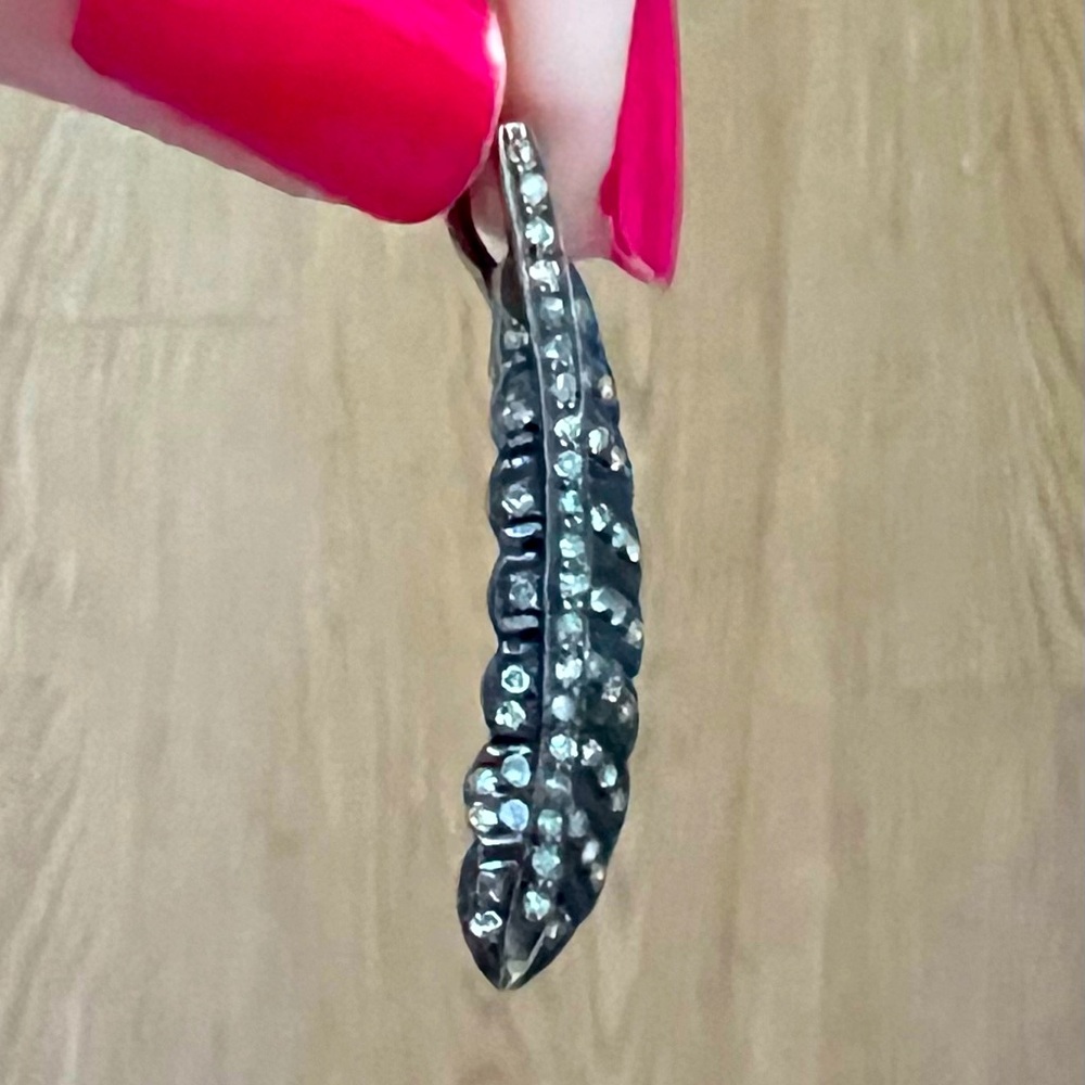 Oxidized Silver with Pavé Diamonds feather pendant.